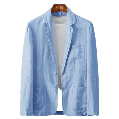 Light blue jacket on a hanger against a dark background