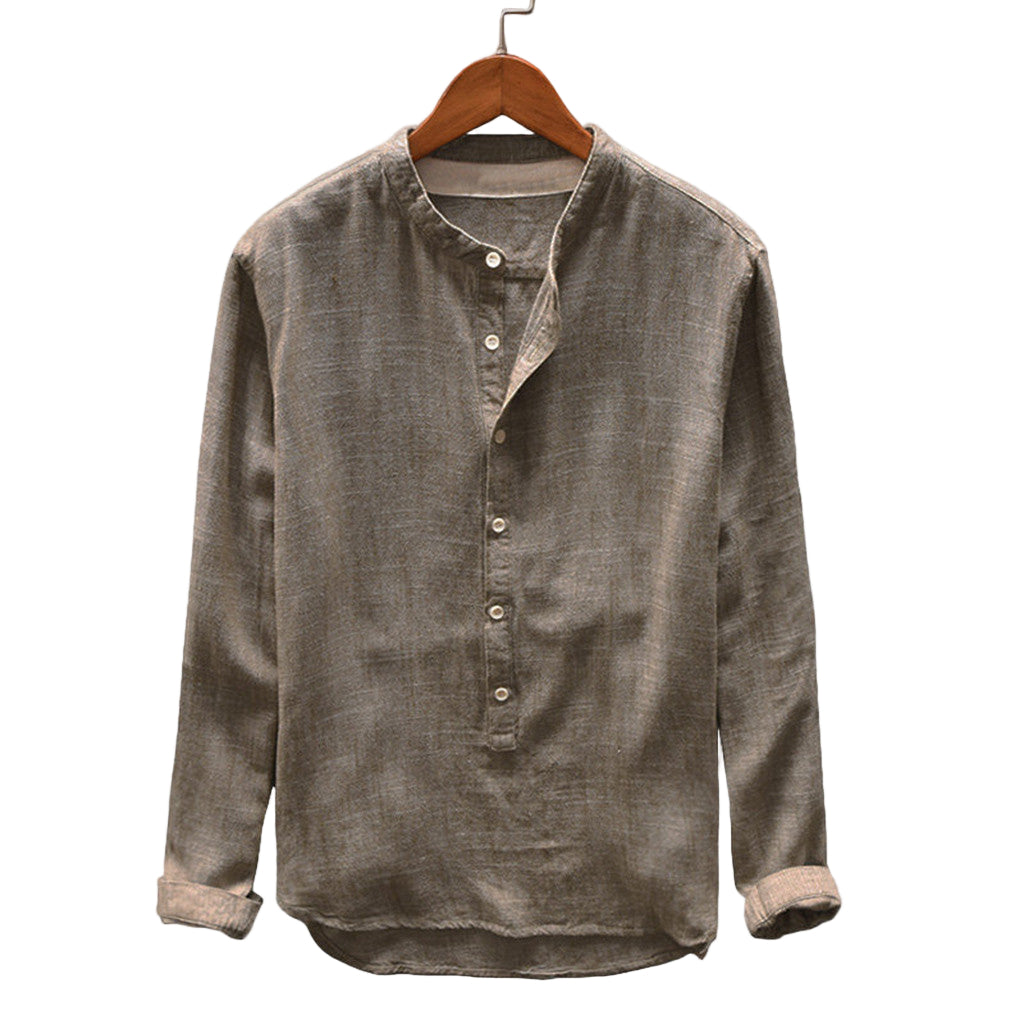 Brown button-up shirt on a wooden hanger against a gray background