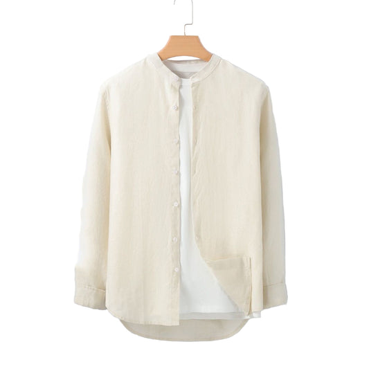 Beige shirt on a hanger against a white background