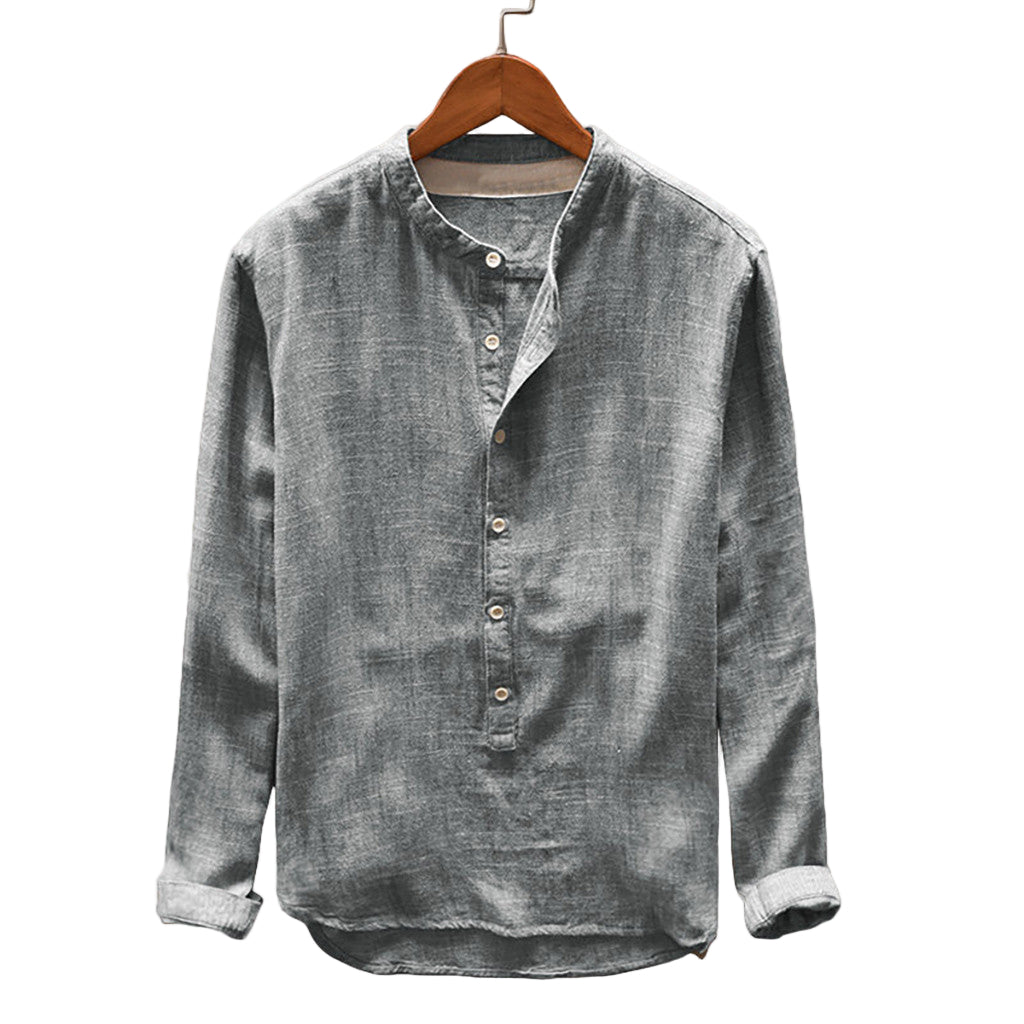 Gray button-up shirt on a wooden hanger against a gray background